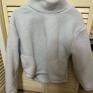 Plush cropped length turtleneck sweatshirt